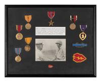 [WORLD WAR II]. Two framed displays featuring medals and patches of identified soldiers.