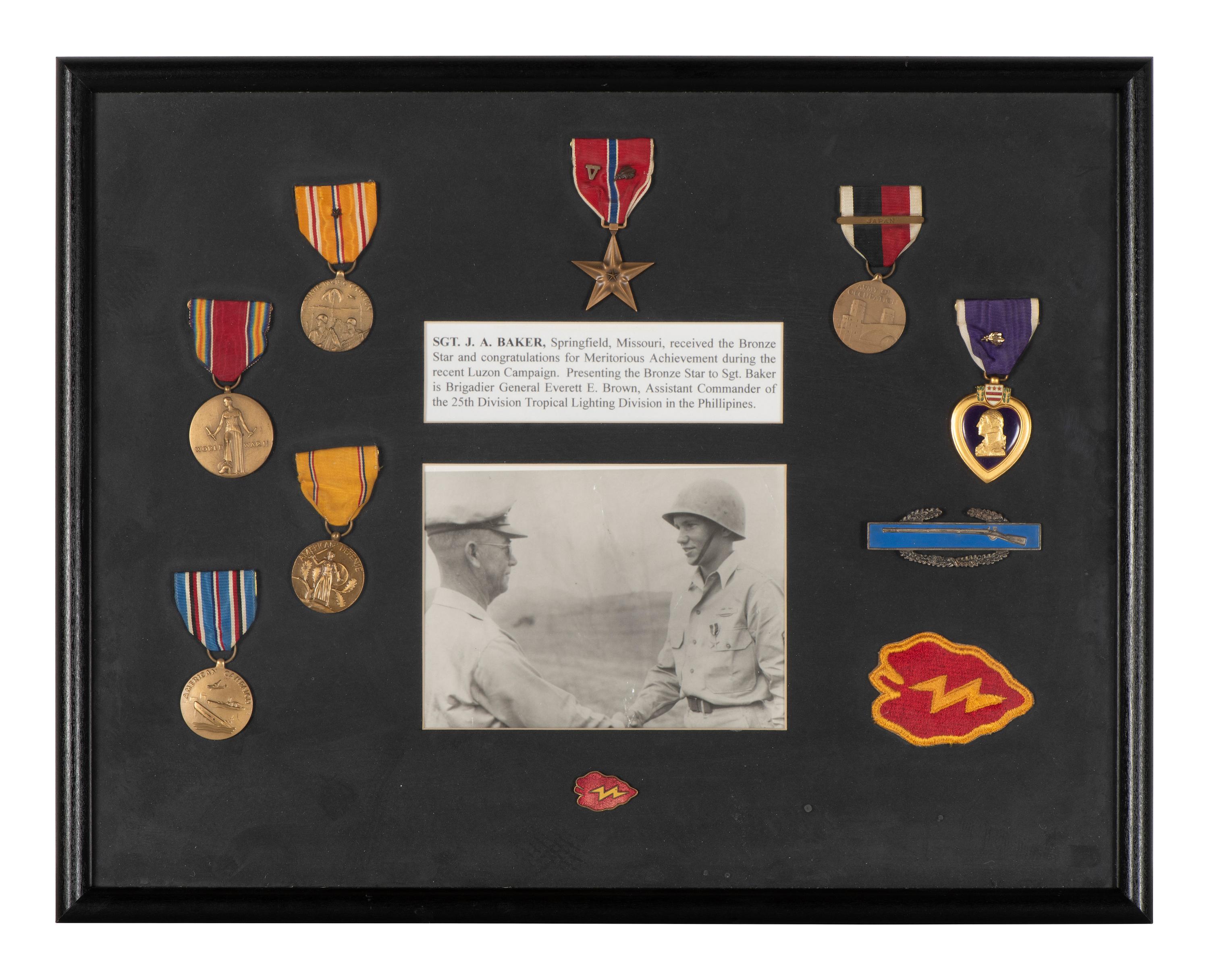 [WORLD WAR II]. Two framed displays featuring medals and patches of identified soldiers.