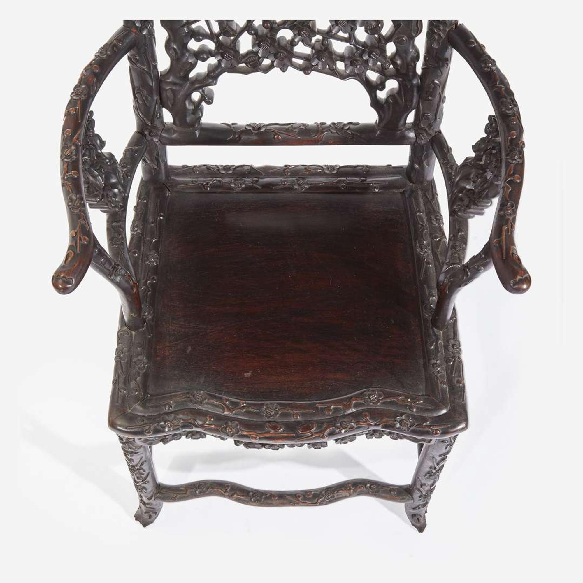 An unusual pair of Chinese carved hardwood armchairs 中国硬木扶手椅一对 Late 19th to early 20th Century ?????????????