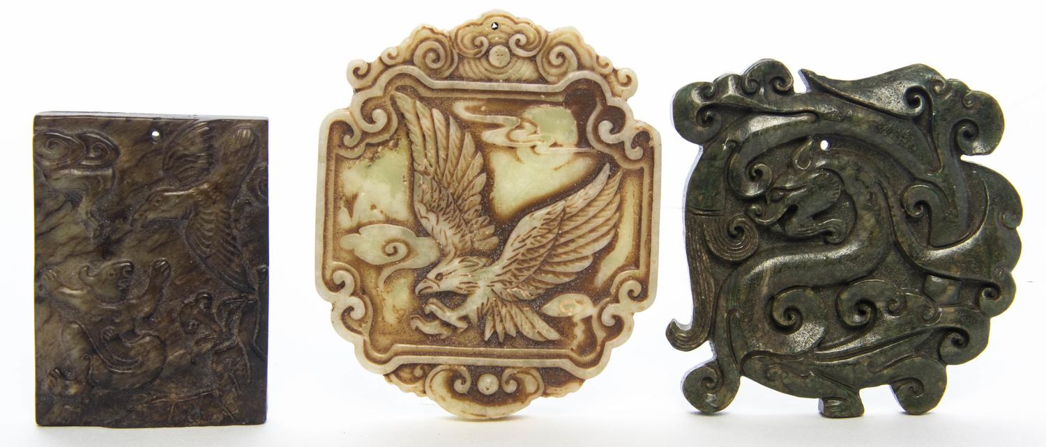 Three Relief Carved Stone Plaques Height of first 3 3/8 inches.