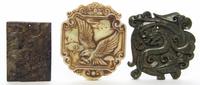 Three Relief Carved Stone Plaques Height of first 3 3/8 inches.