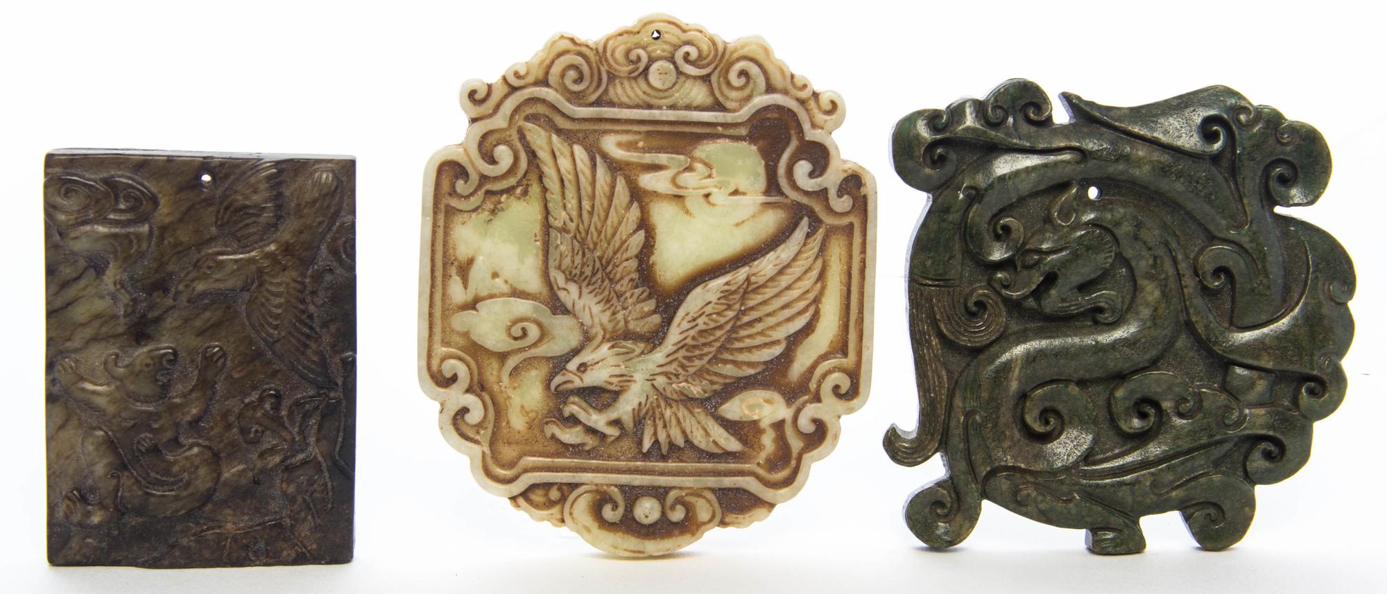 Three Relief Carved Stone Plaques Height of first 3 3/8 inches.