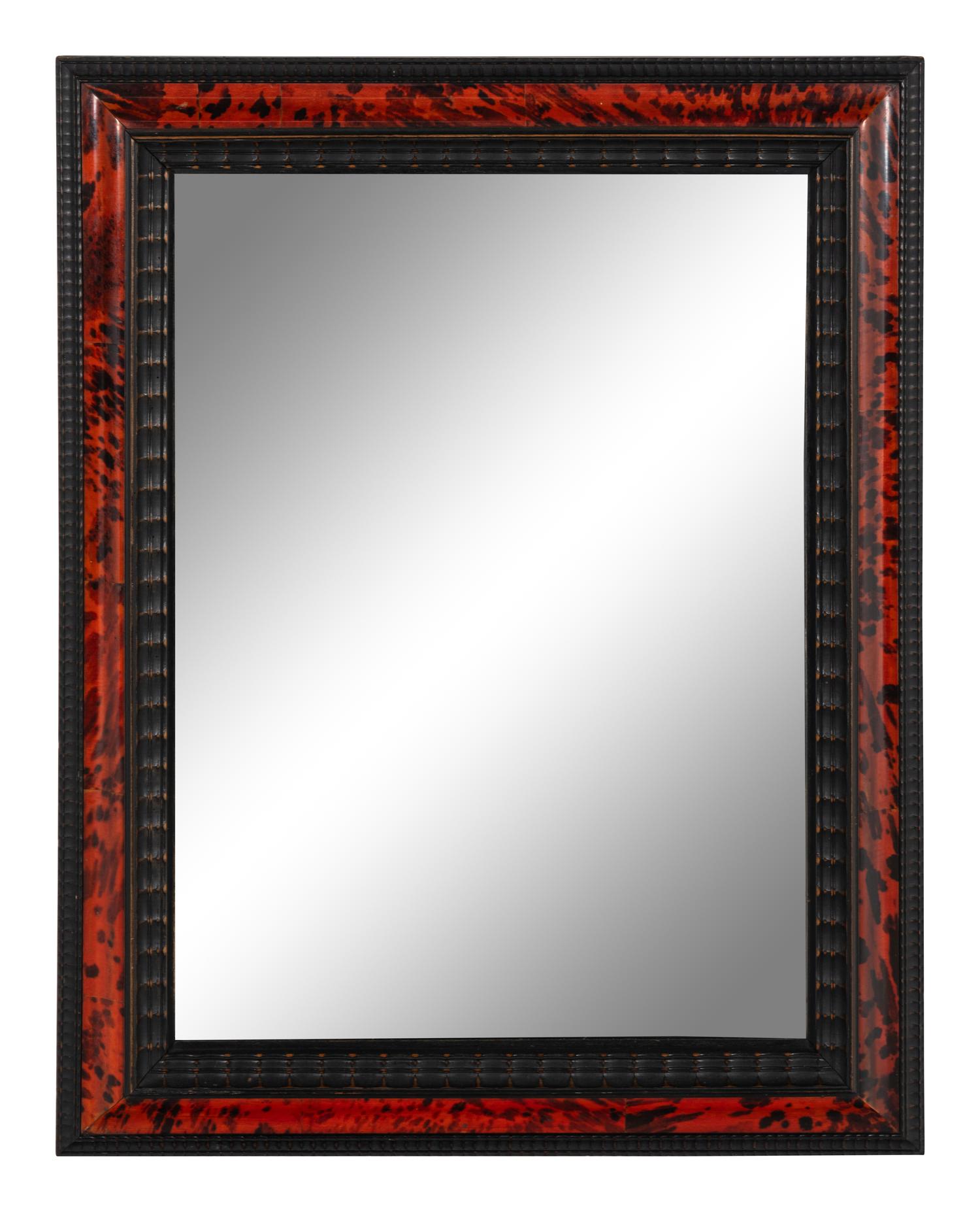 A Flemish Tortoise Shell Veneered and Ripple Molded Ebonized Mirror