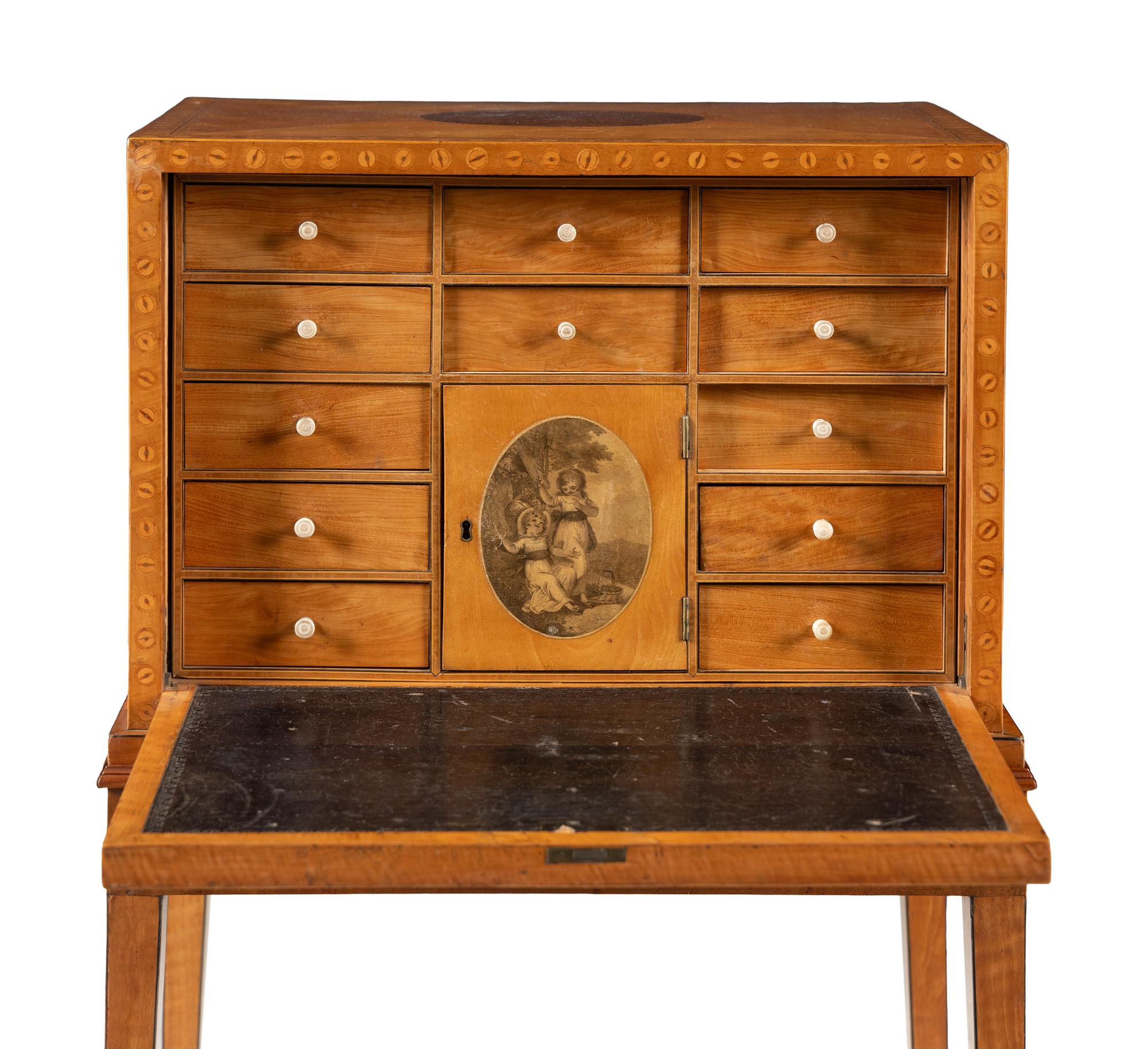 A George III Satinwood, Yew Wood and Marquetry Fall-Front Writing Cabinet on Stand