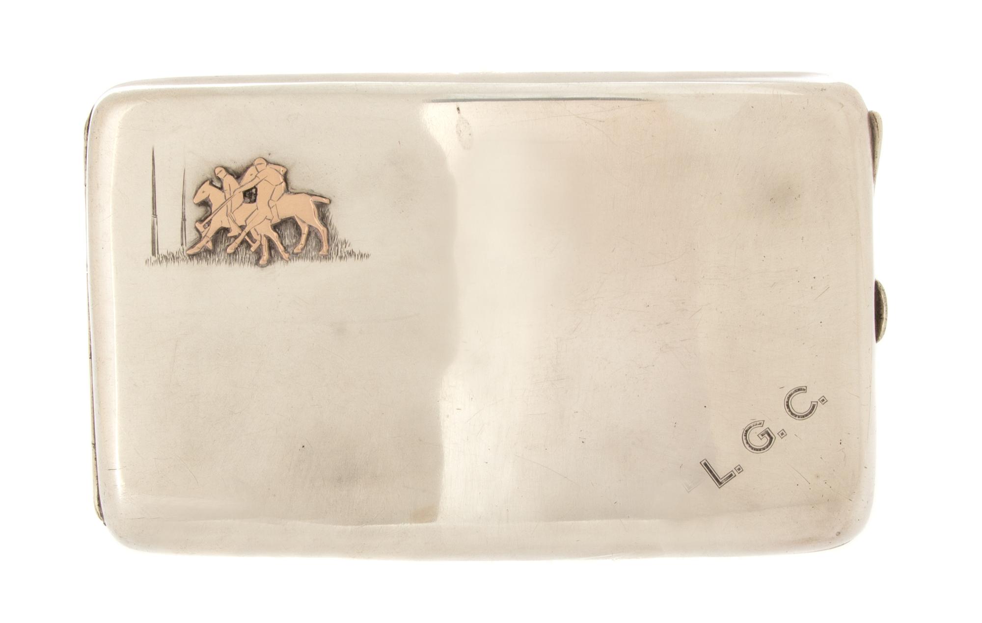 An English Silver Cigarette Case, Charles S. Green & Co., Birmingham, 1918, the lid having a rose gold applique of two polo players, th