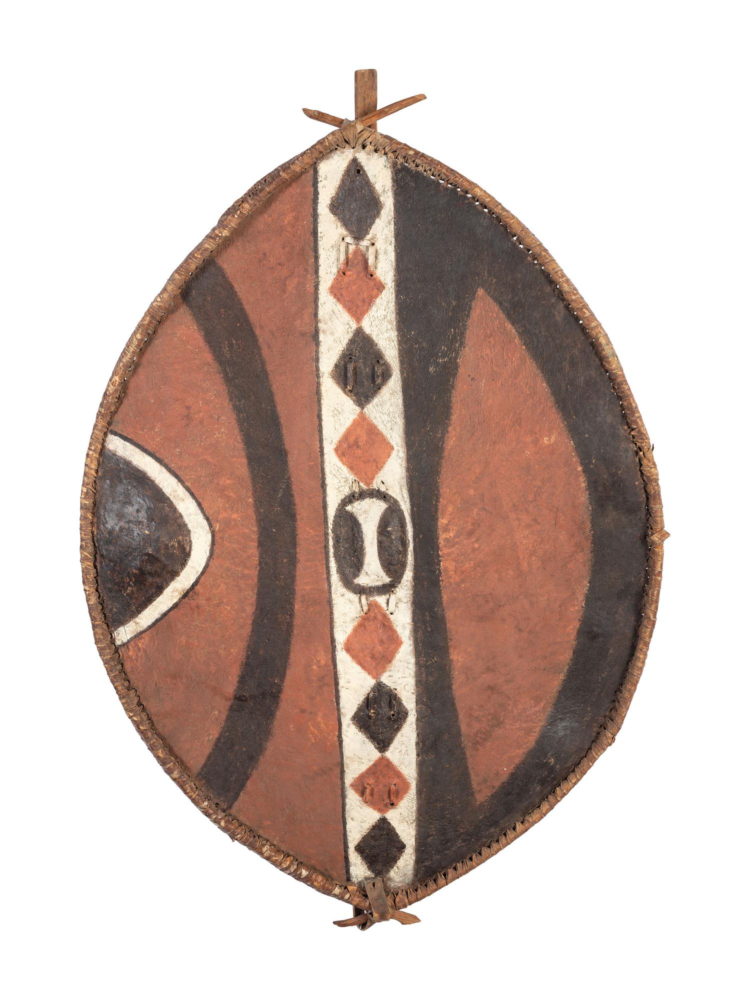 A Painted Leather African Shield and a Painted Wood Board Depicting an African Mask