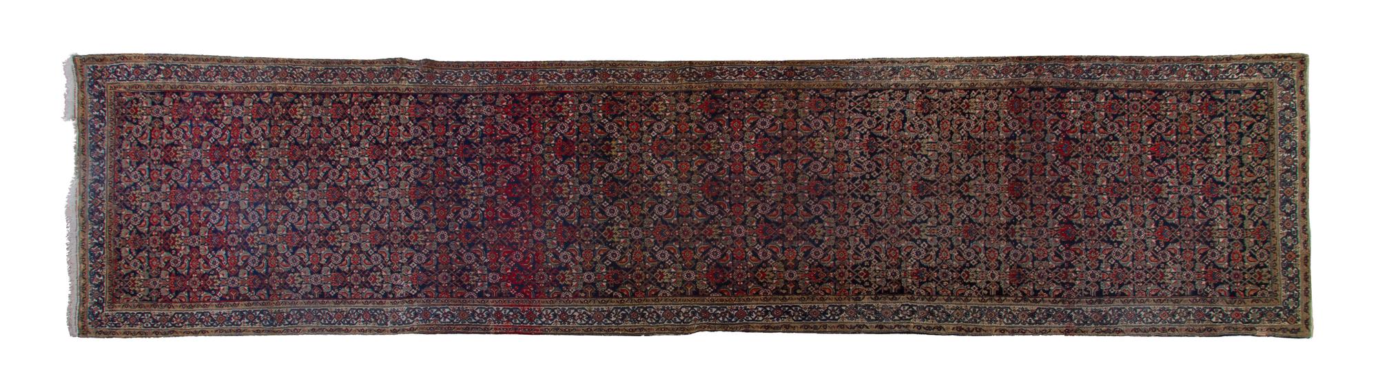 A Northwest Persian Wool Runner, 15 feet 2 inches x 3 feet 6 inches.