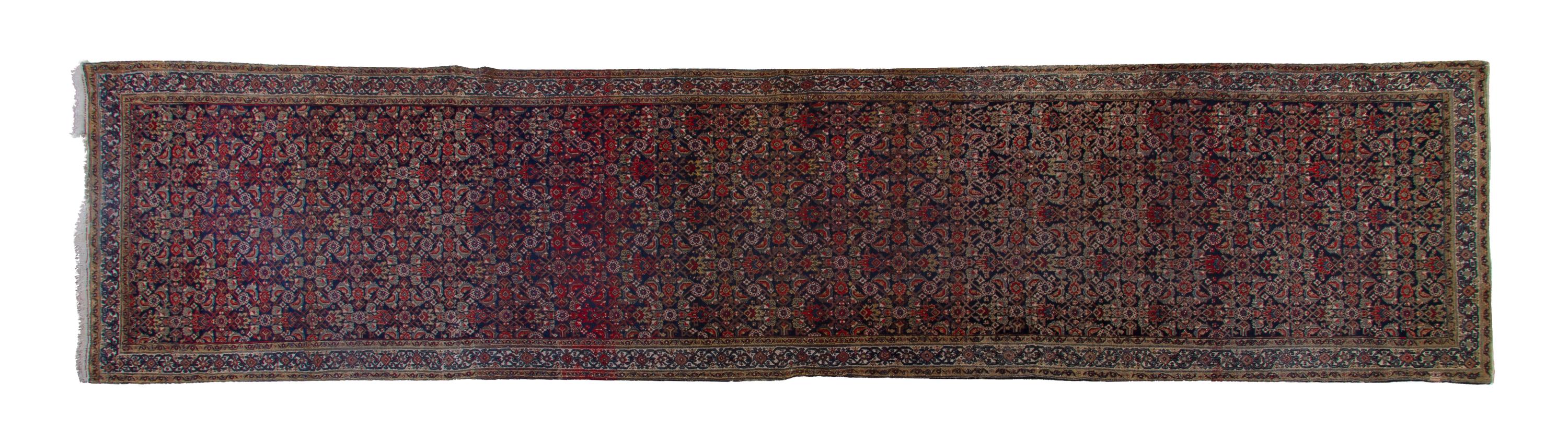 A Northwest Persian Wool Runner, 15 feet 2 inches x 3 feet 6 inches.