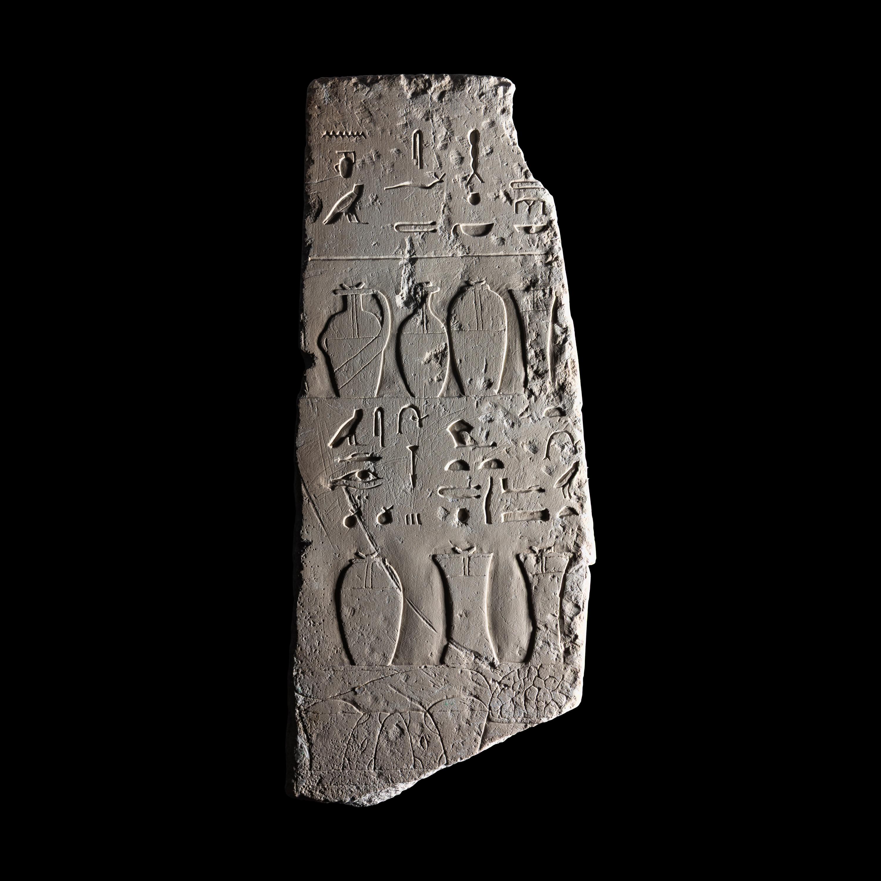 An Egyptian Limestone Wall Fragment