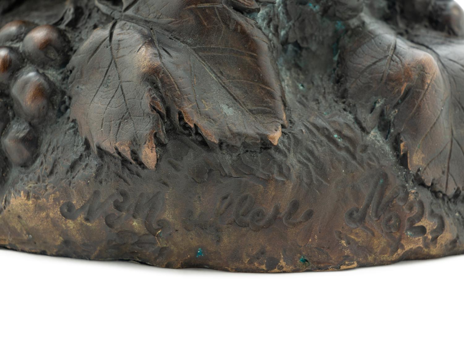 A Continental Bronze Figure of a Putto