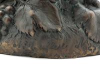 A Continental Bronze Figure of a Putto