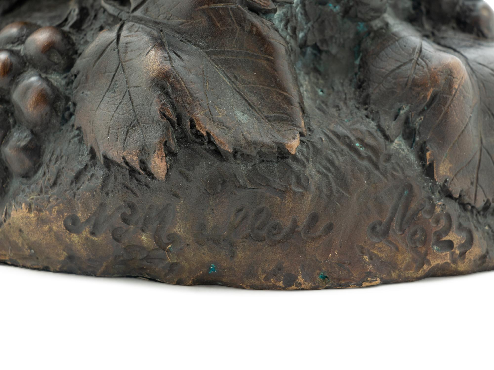 A Continental Bronze Figure of a Putto