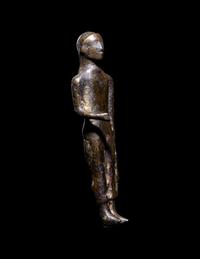 A Greek Bronze Kouros