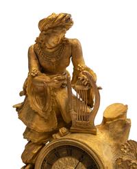 A Continental Gilt Metal Figural Mantel Clock