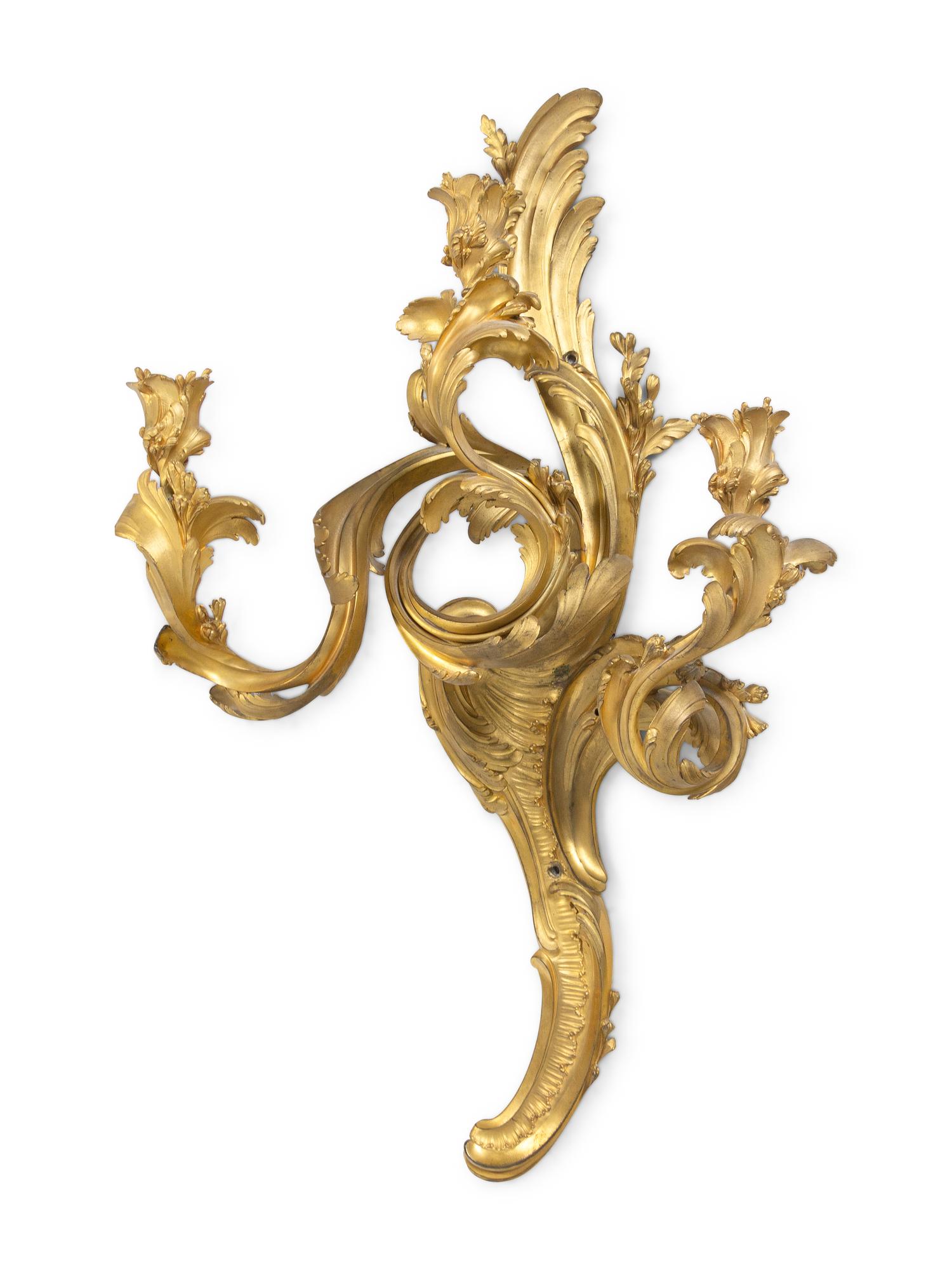 A Pair of Louis XV Gilt Bronze Three-Light Wall Sconces