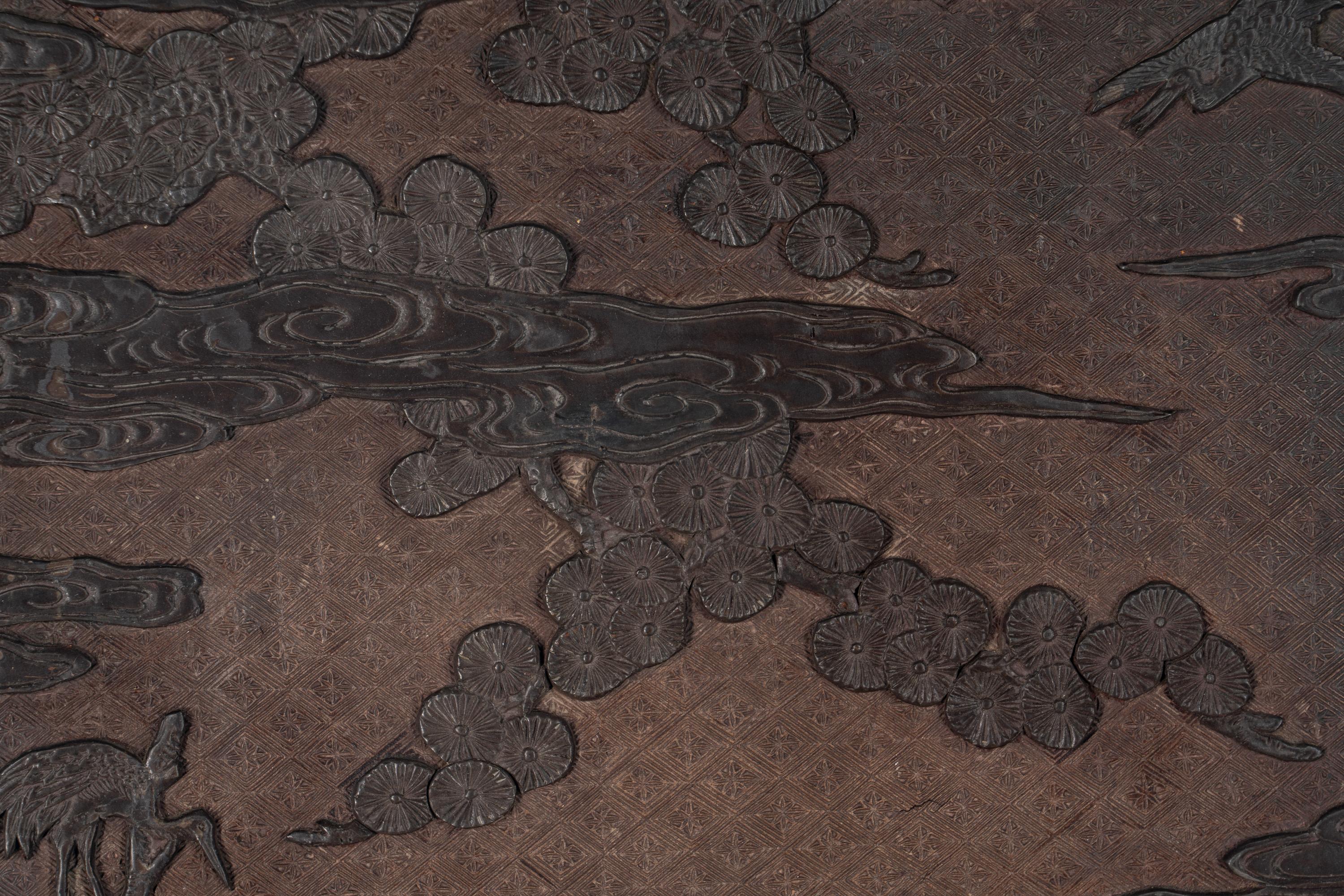 A Chinese Carved Lacquer 'Immortals' Wall Panel
