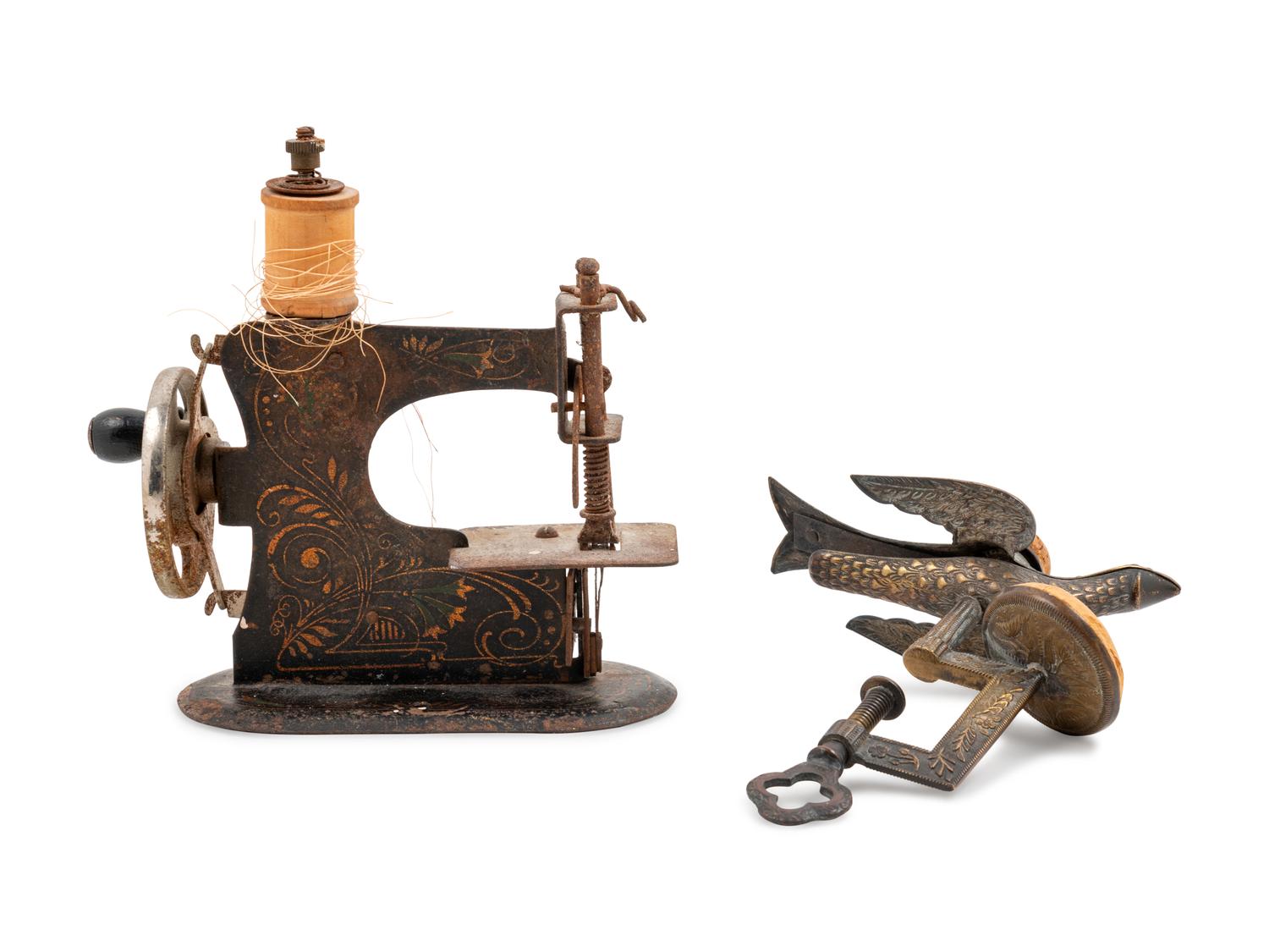 A Sewing Machine-Form Spool Winder and a Brass Sewing Bird