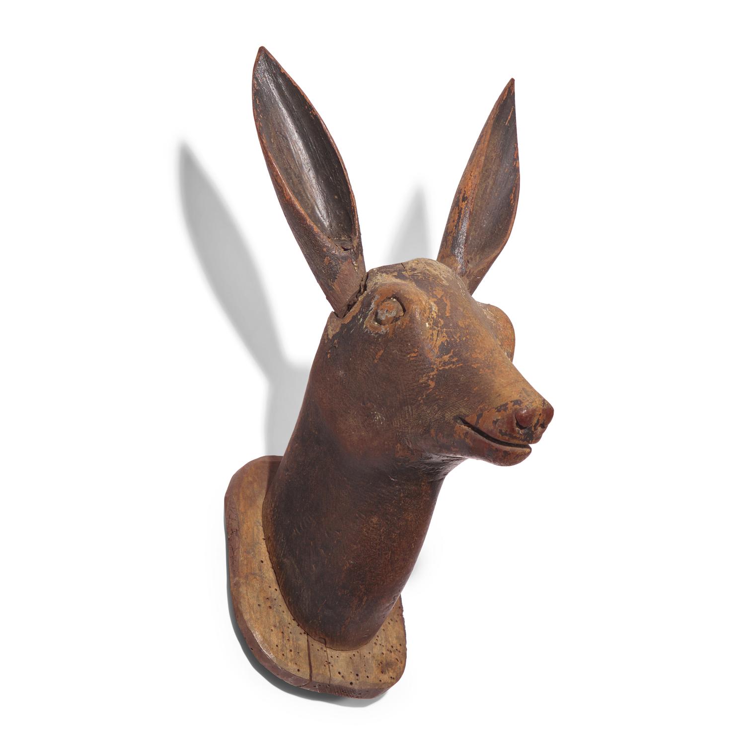 A Carved and Painted Wood Deer Head
