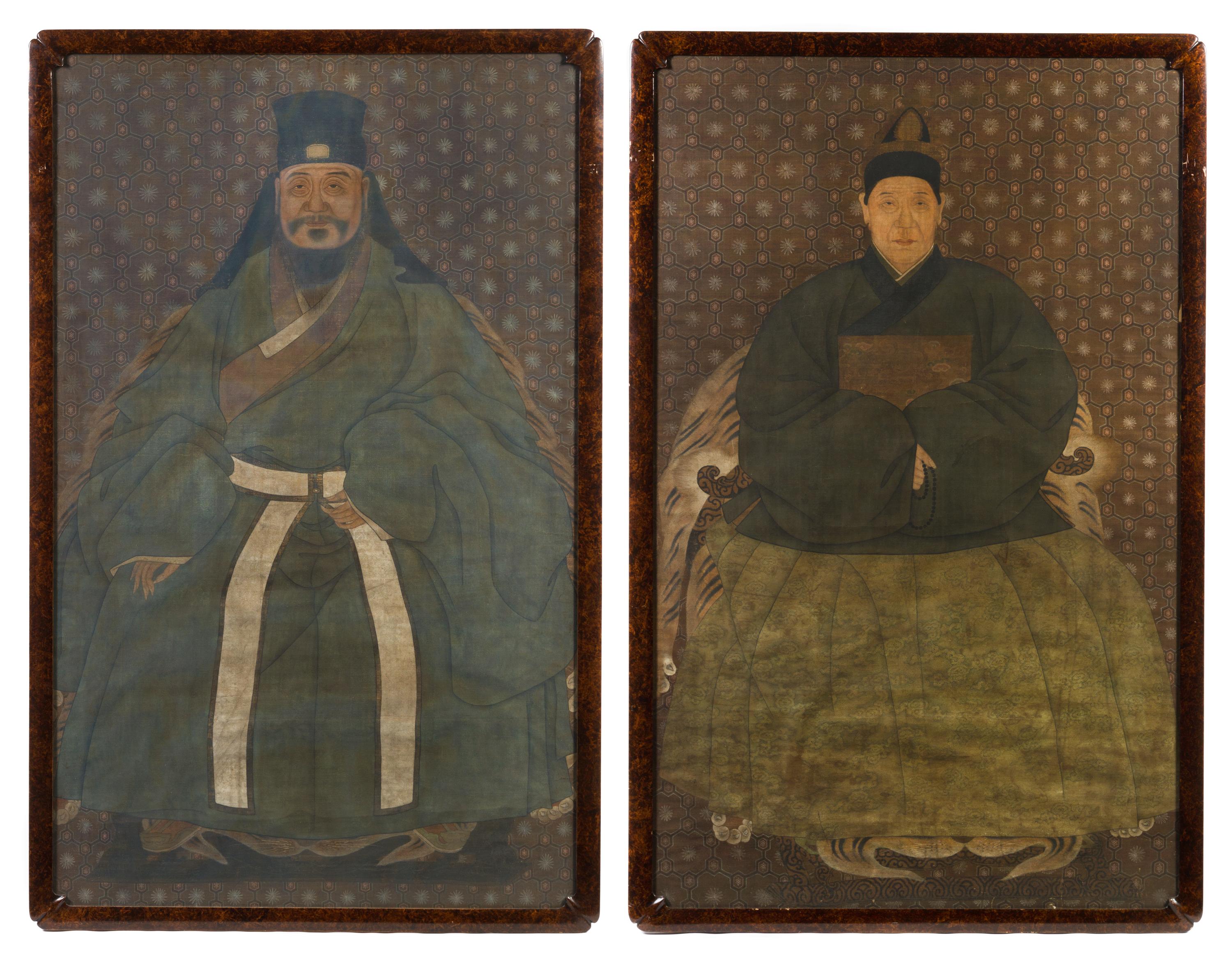 A Set of Two Ancestor Portraits, , depicting a couple each seated in a horseshoe back armchair, wearing voluminous robes, with a calm e