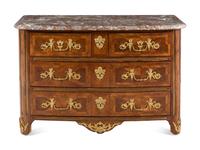 A Régence Gilt Bronze Mounted Walnut Parquetry Commode