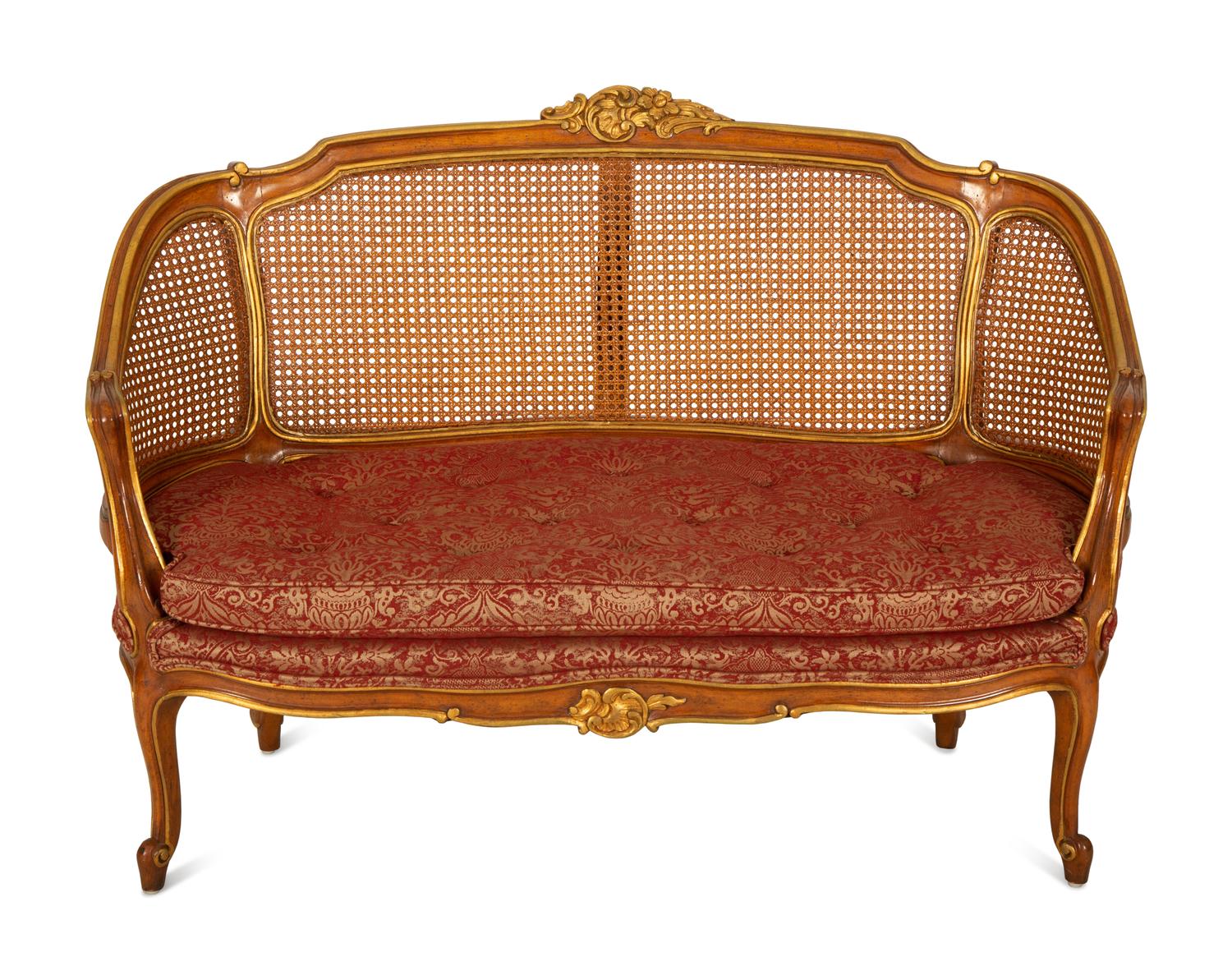 A Pair of Louis XV Style Stained and Giltwood Settees
