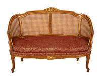 A Pair of Louis XV Style Stained and Giltwood Settees