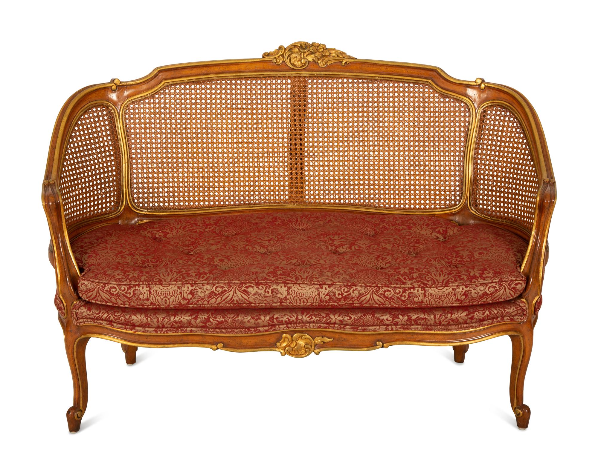 A Pair of Louis XV Style Stained and Giltwood Settees