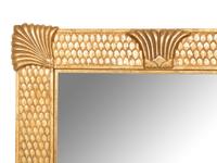 An Egyptian Revival Gilt Metal Framed Mirror