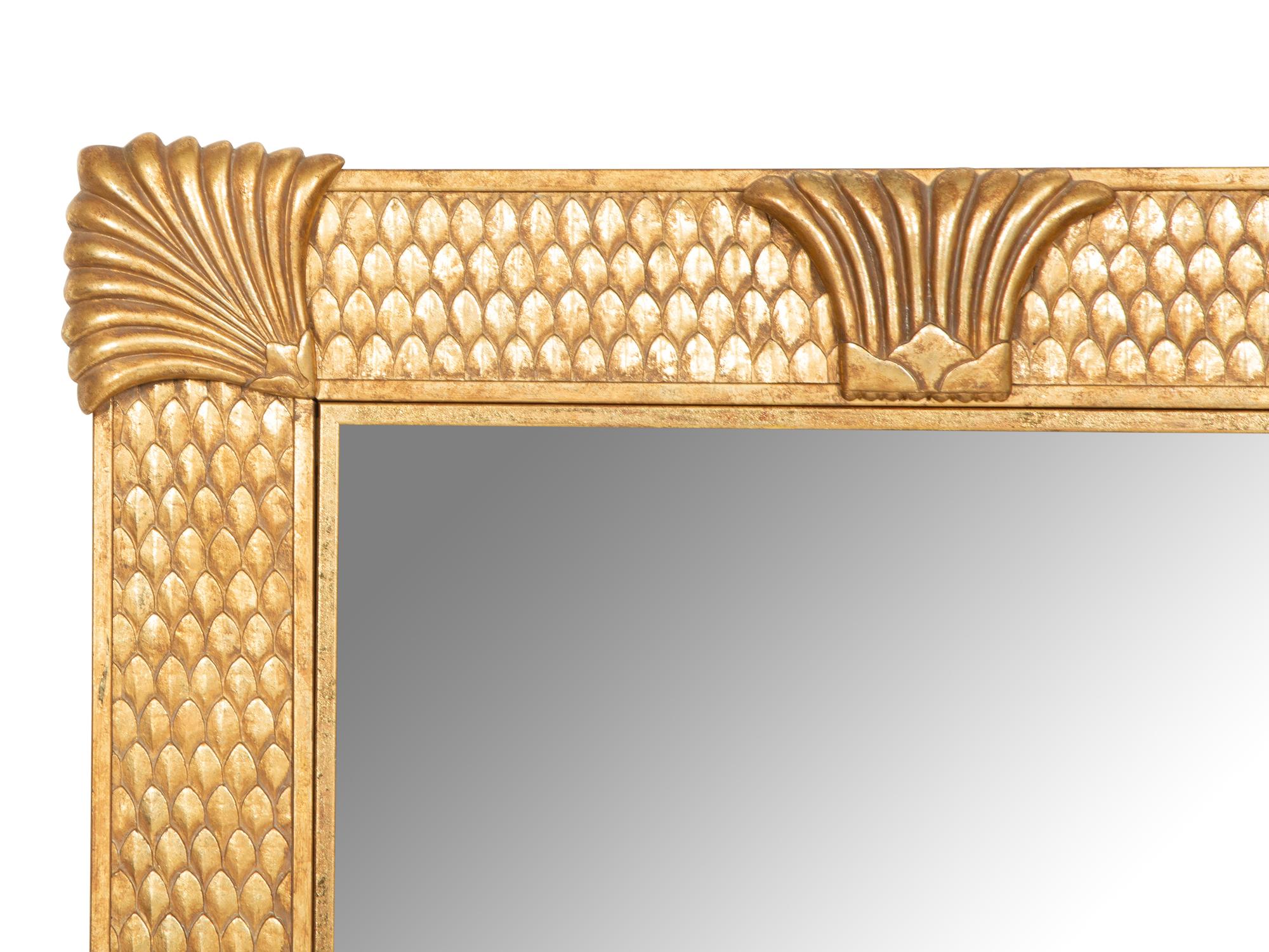 An Egyptian Revival Gilt Metal Framed Mirror
