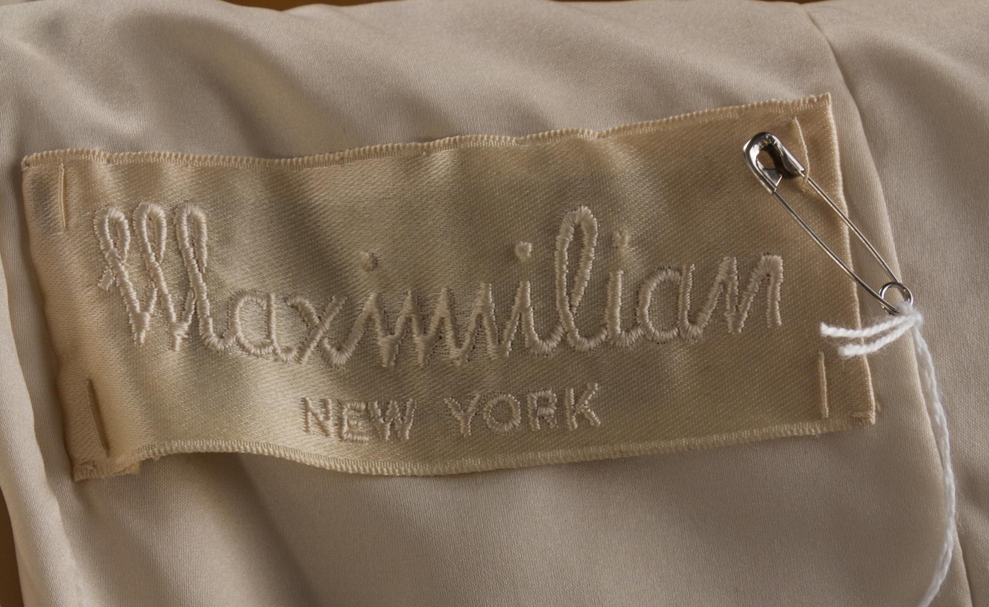 A Maximilian Cream Broadtail Coat, No size.