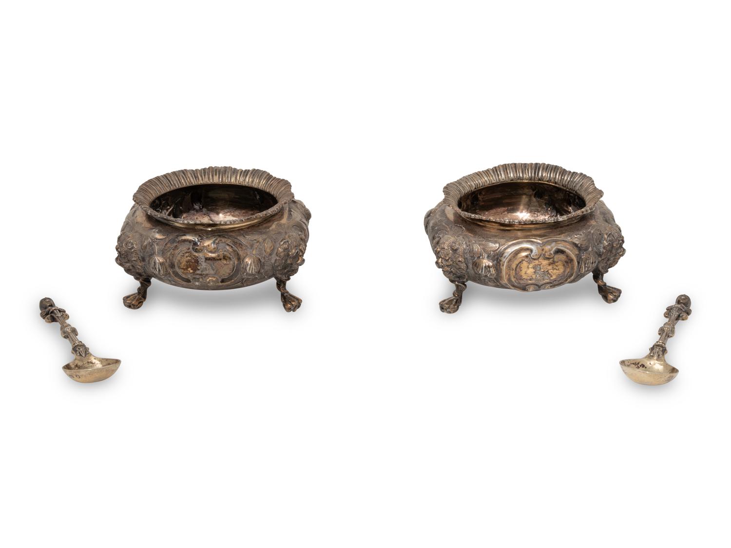 A Pair of English Silver-Gilt Salt Cellars and Spoons
