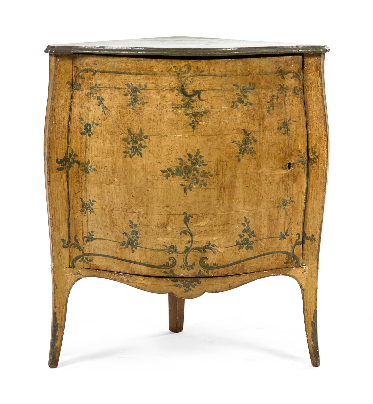 An Italian Painted Corner Cabinet, Height 34 1/2 x width 29 1/2 x depth 20 inches.