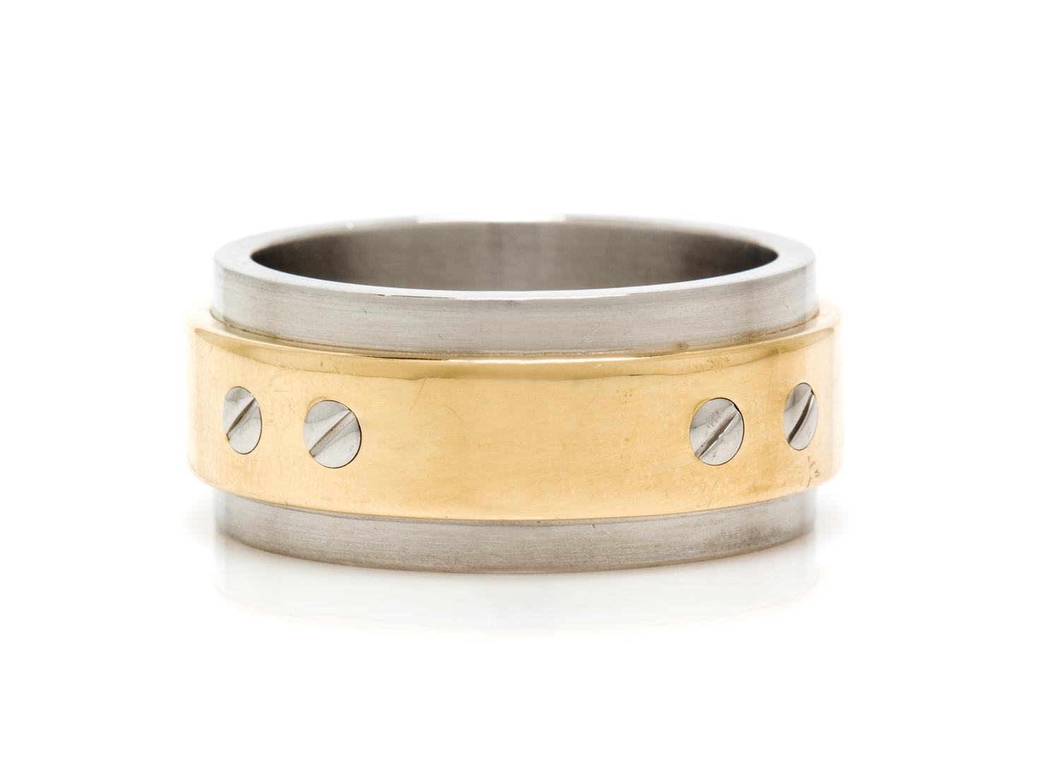 An 18 Karat Yellow Gold and Stainless Steel Santos 100 Ring, Cartier, 15.40 dwts.
