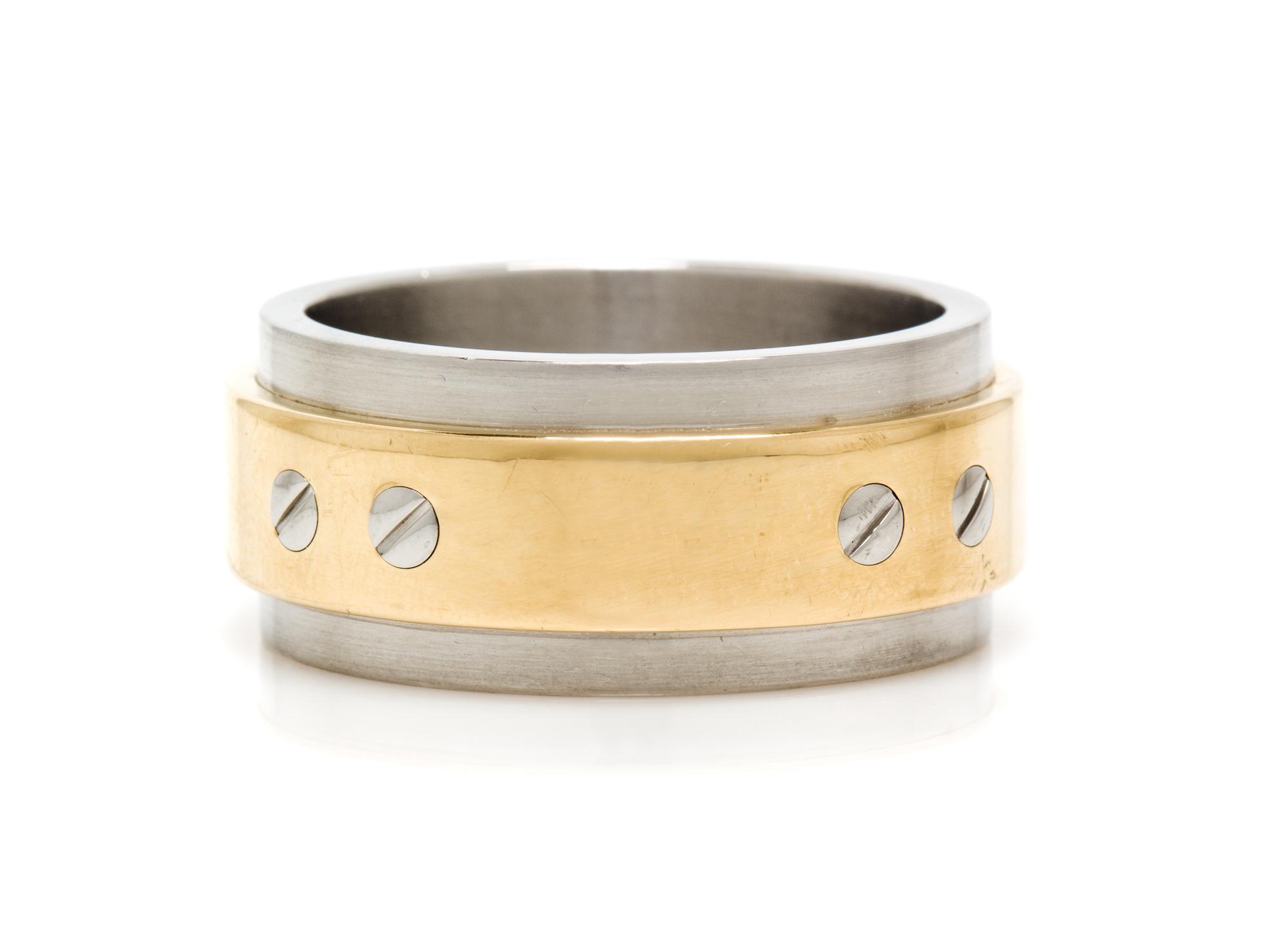 An 18 Karat Yellow Gold and Stainless Steel Santos 100 Ring, Cartier, 15.40 dwts.