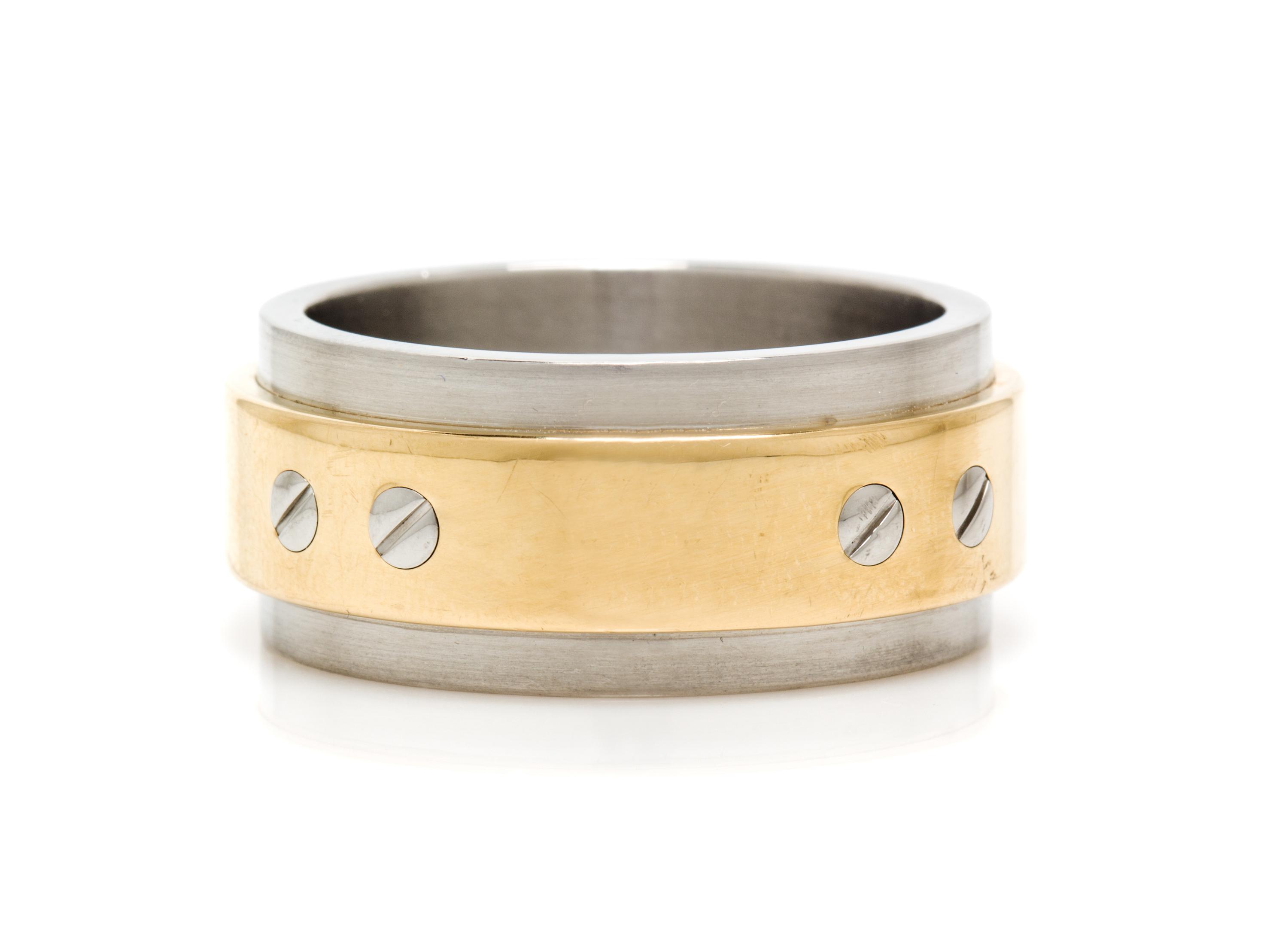 An 18 Karat Yellow Gold and Stainless Steel Santos 100 Ring, Cartier, 15.40 dwts.