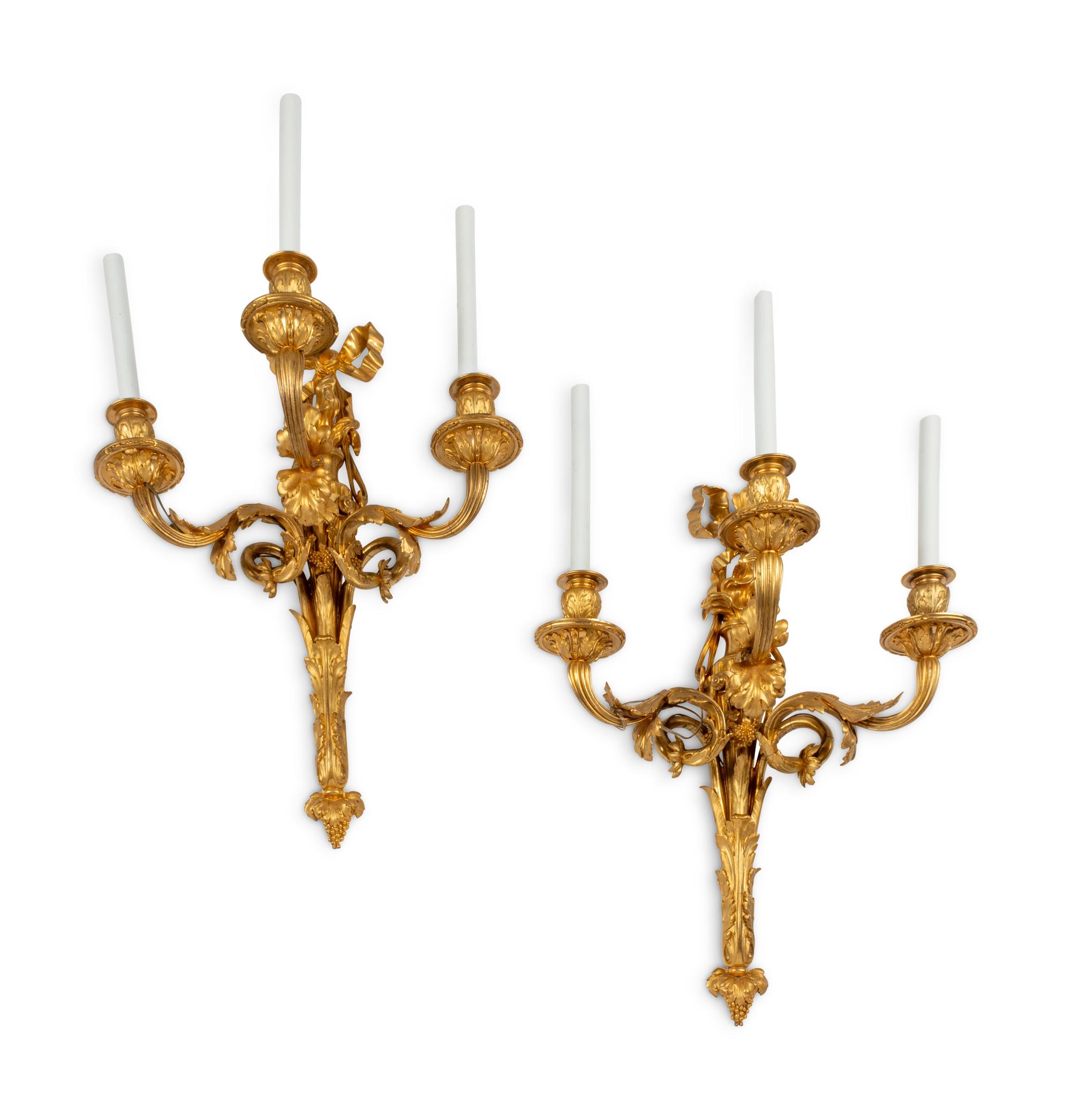 A Pair of Louis XVI Style Gilt Bronze Three-Light Sconces