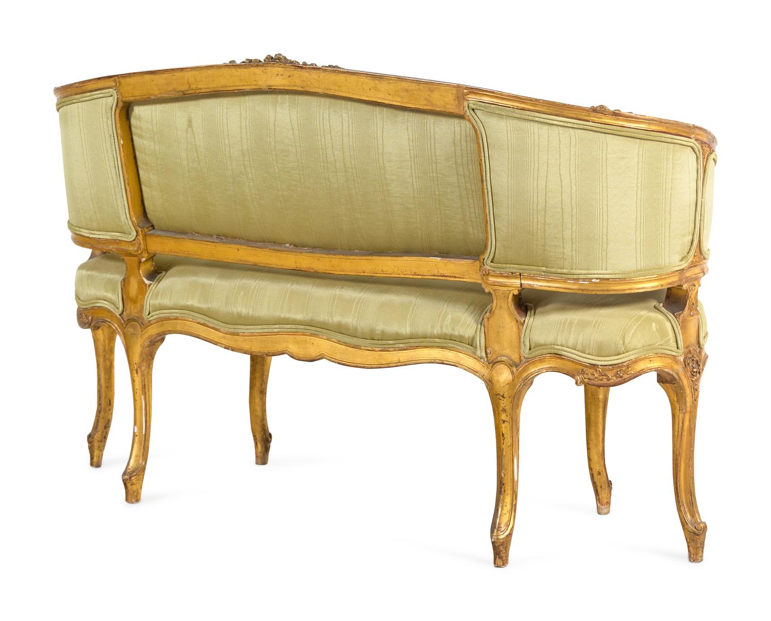 A Louis XV Style Carved Giltwood Settee
