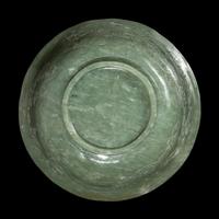 A Chinese Celadon Jade 'Dragon' Bowl, 20th Century 近代 青玉刻龍紋碗