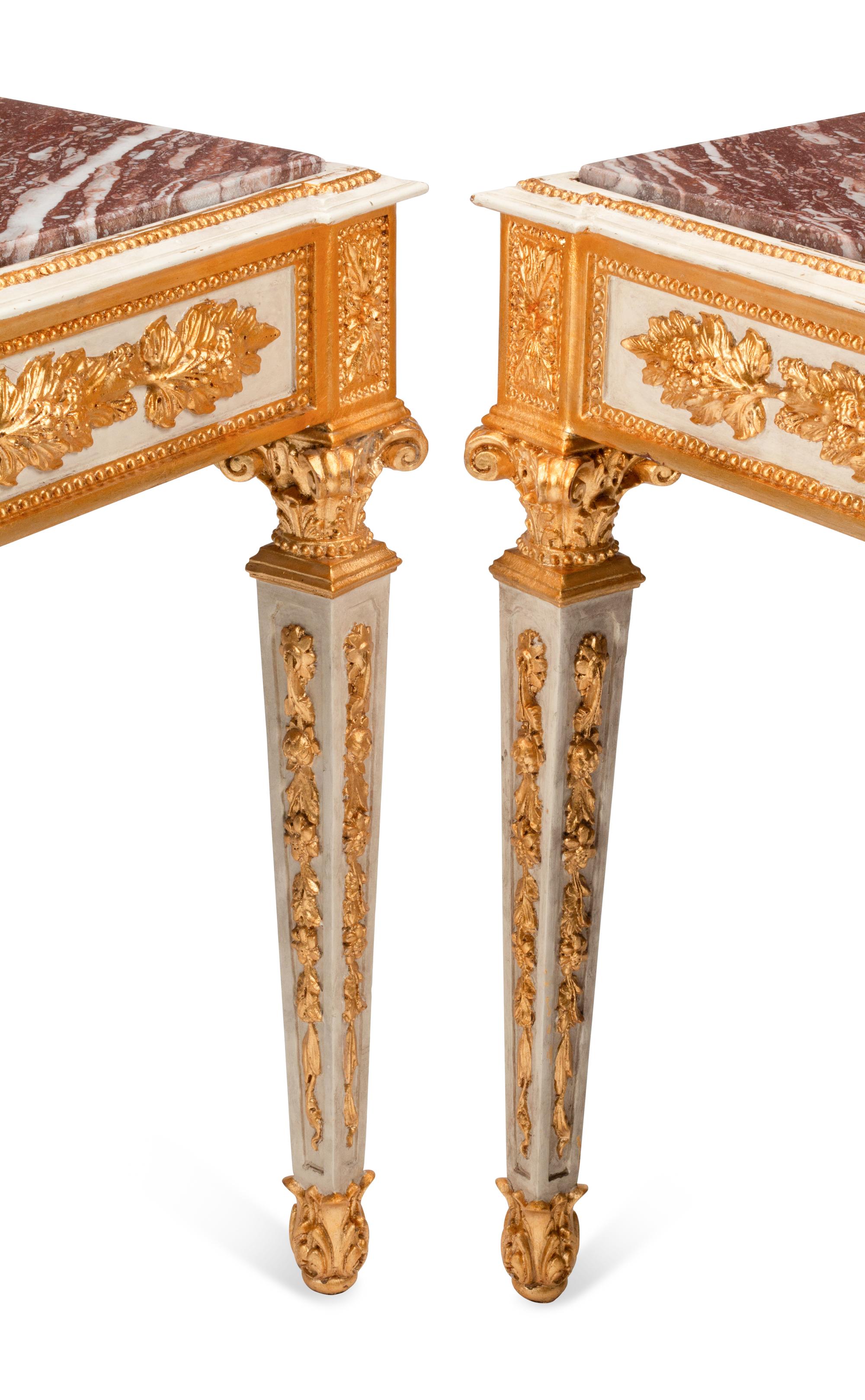 A Pair of Italian Neoclassical Style Painted and Parcel Gilt Console Tables