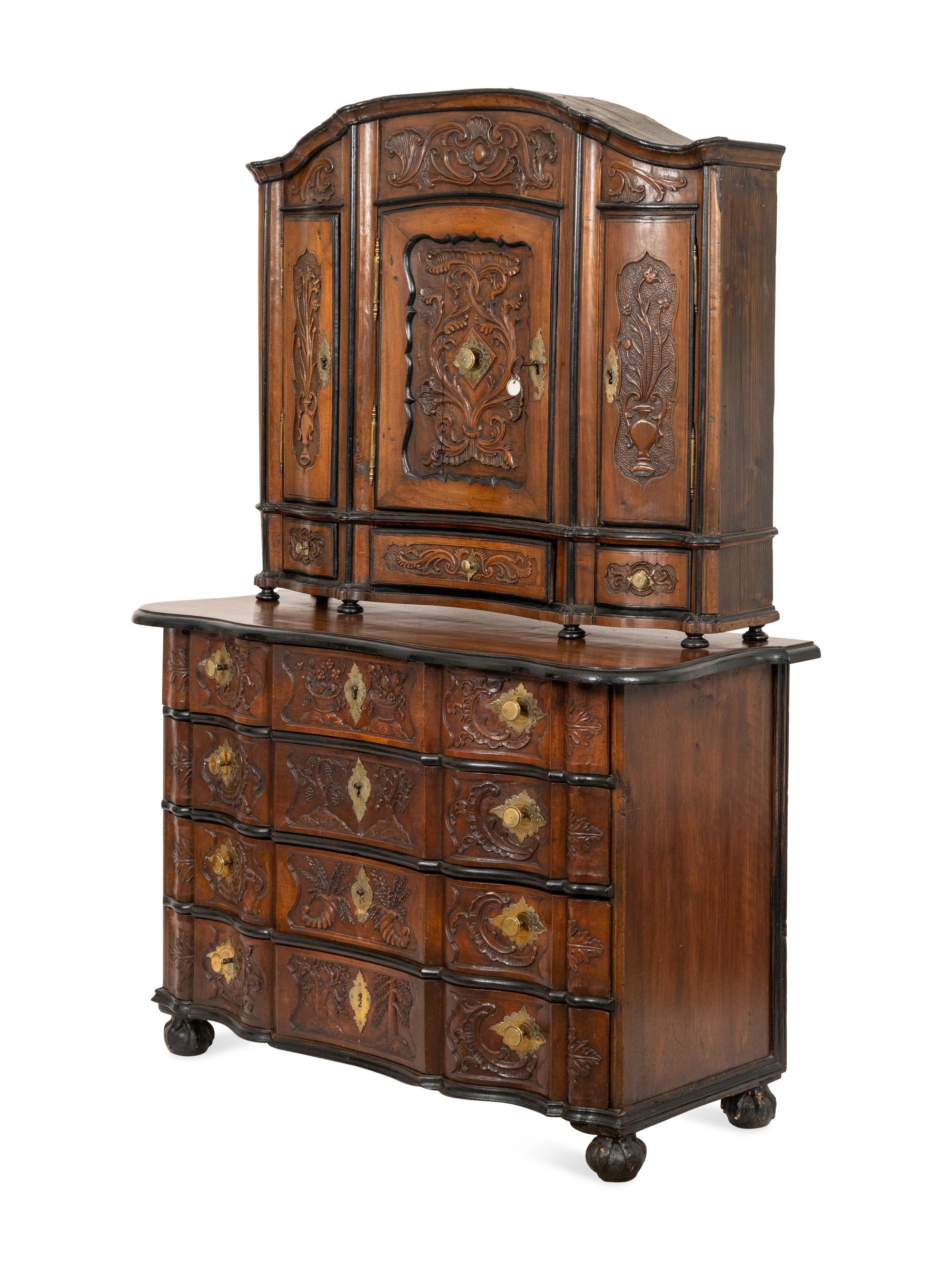 A Portuguese Carved Walnut Parcel Ebonized Bureau Cabinet on Chest
