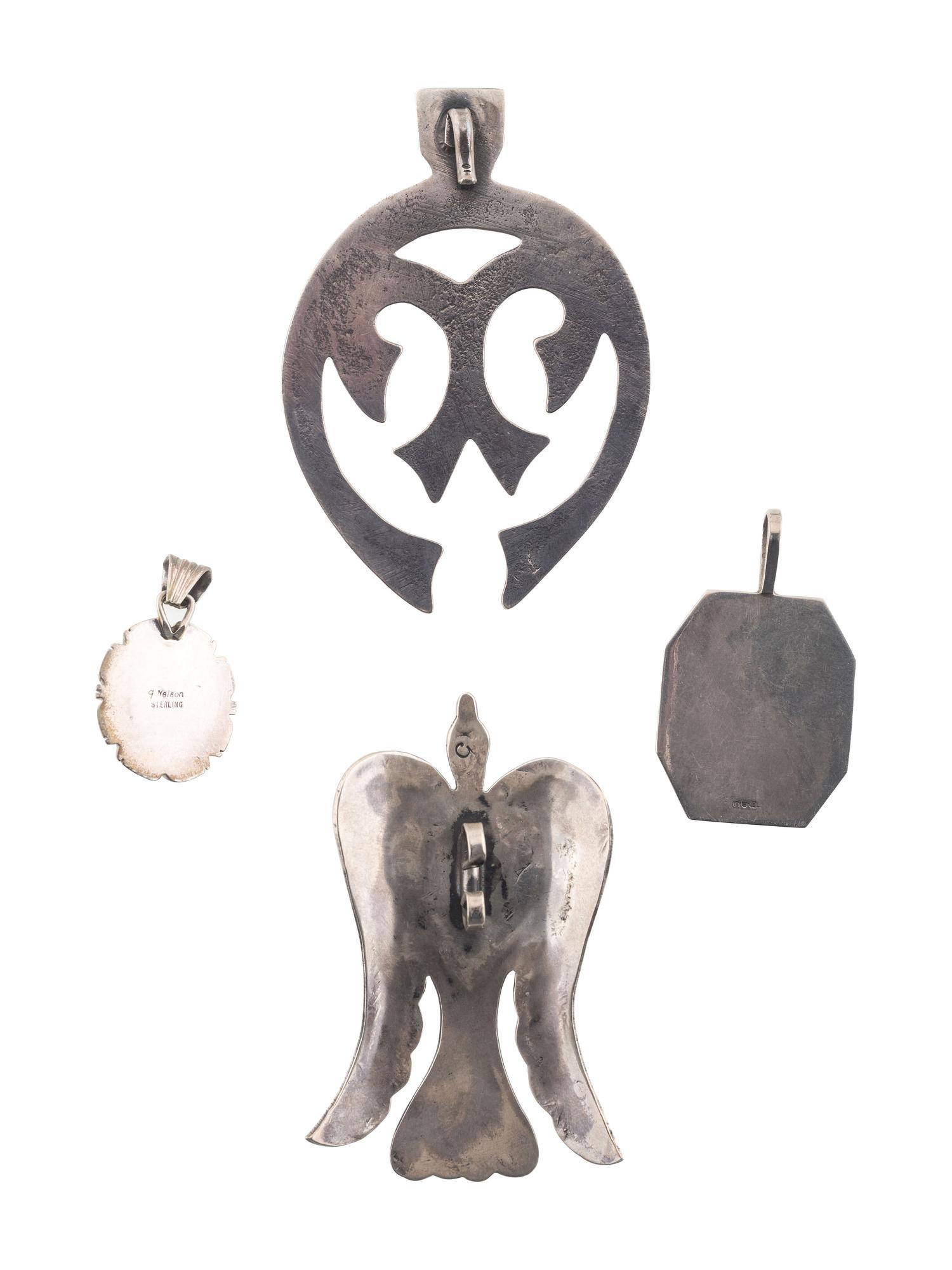 Navajo and Kewa Silver Pendants