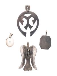 Navajo and Kewa Silver Pendants