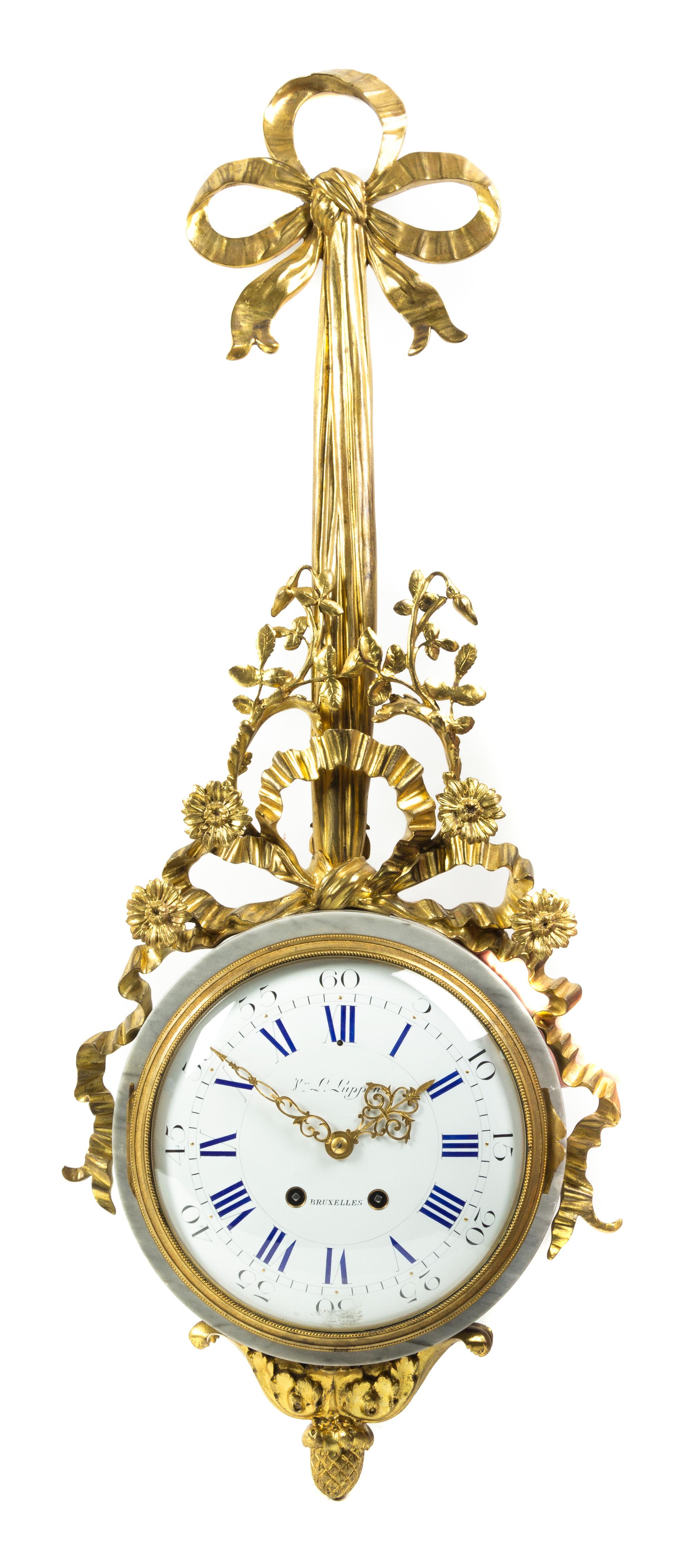 A French Gilt Bronze and Marble Cartel Clock, Luppens, Height 35 inches.
