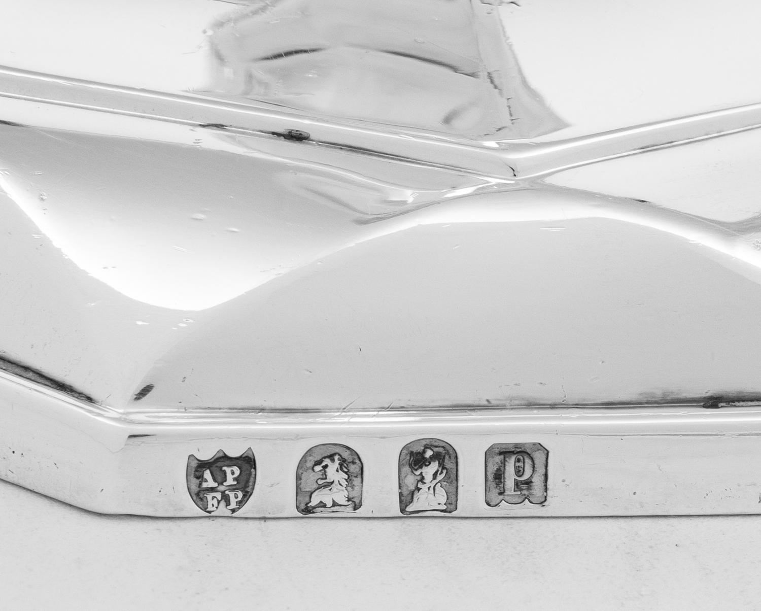 A Set of Four English Britannia Silver Candlesticks