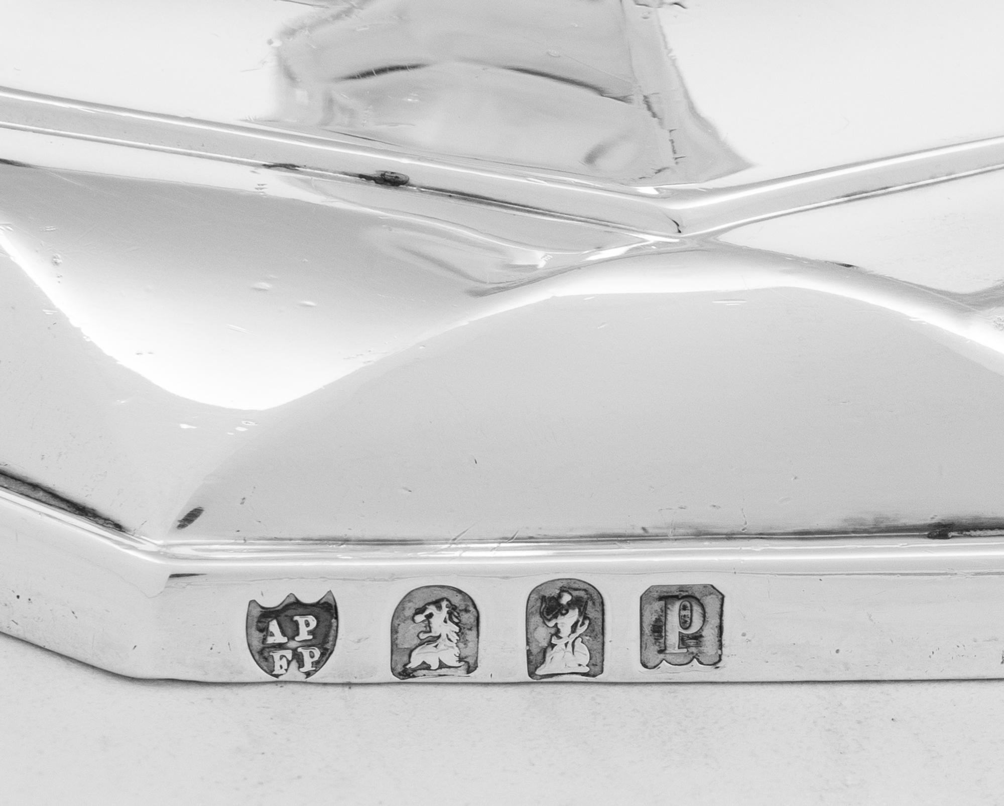 A Set of Four English Britannia Silver Candlesticks
