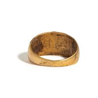 A Roman Gold and Carnelian Finger Ring with Eros Hunting