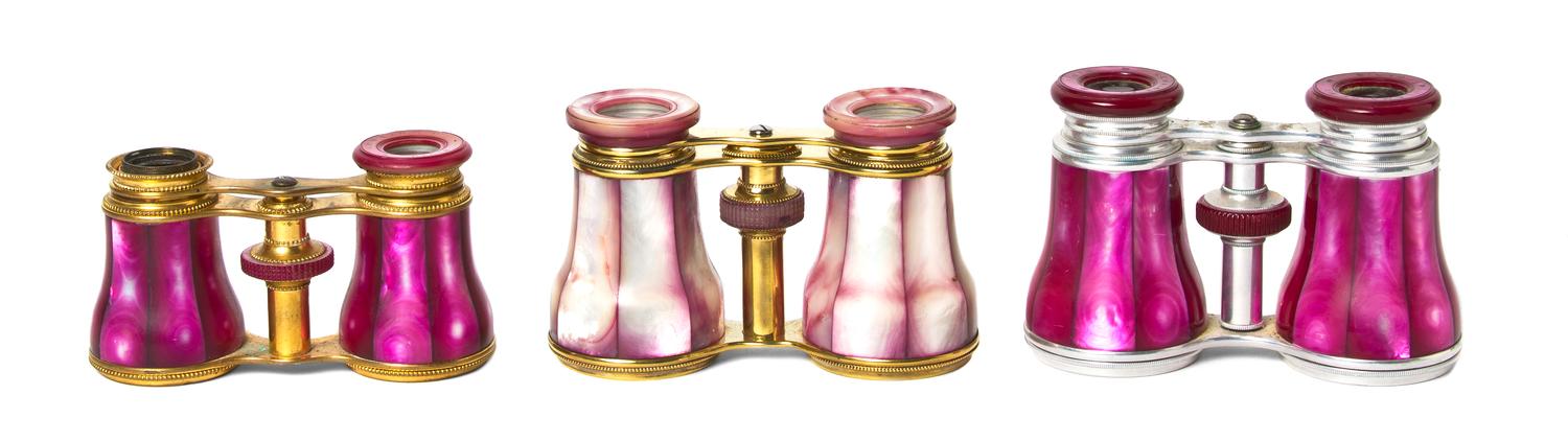 Three Pairs of French Mother-of-Pearl Veneered Opera Glasses, Width of widest 4 1/4 inches.