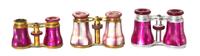 Three Pairs of French Mother-of-Pearl Veneered Opera Glasses, Width of widest 4 1/4 inches.