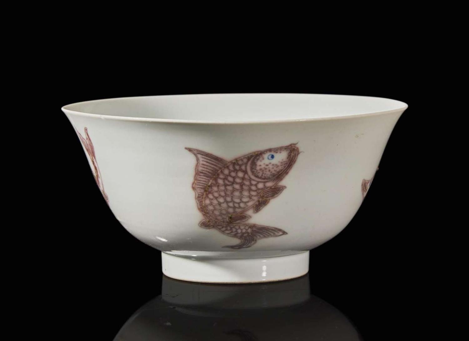 A Chinese underglaze red and blue-decorated "Fishes" bowl, Kangxi period 青花釉裡紅盌 清 康熙