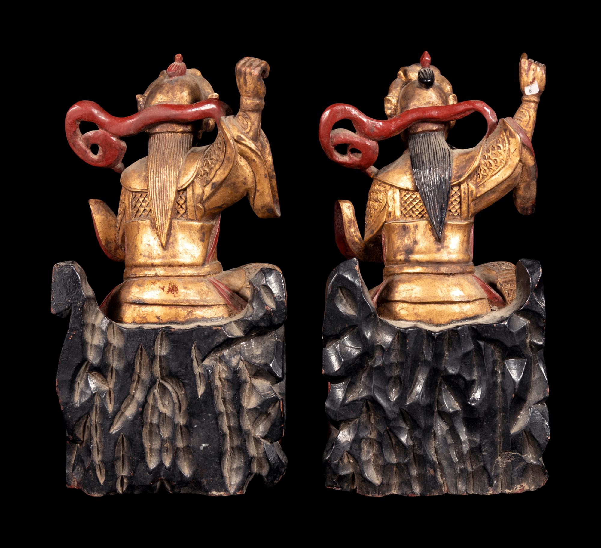 A Pair of Small Chinese Gilt and Red Lacquered Wood Figures of Guardians